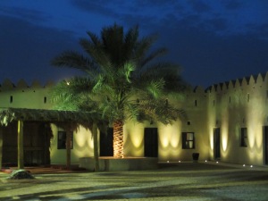 Al Qattara Arts Center at night. 